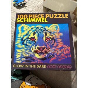 Schimmel 100 piece Glow in the dark snow leopard puzzle by Ceaco